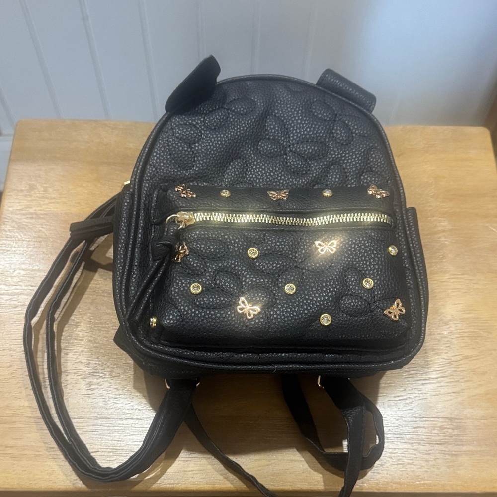 Under One Sky Black Backpack with Gold Accents